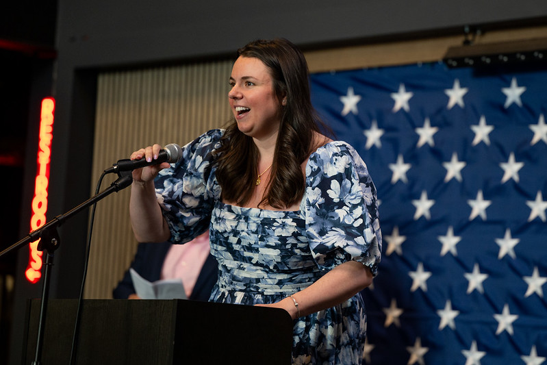 Natalie Breen speaking at a podium during the Chamber banquet.